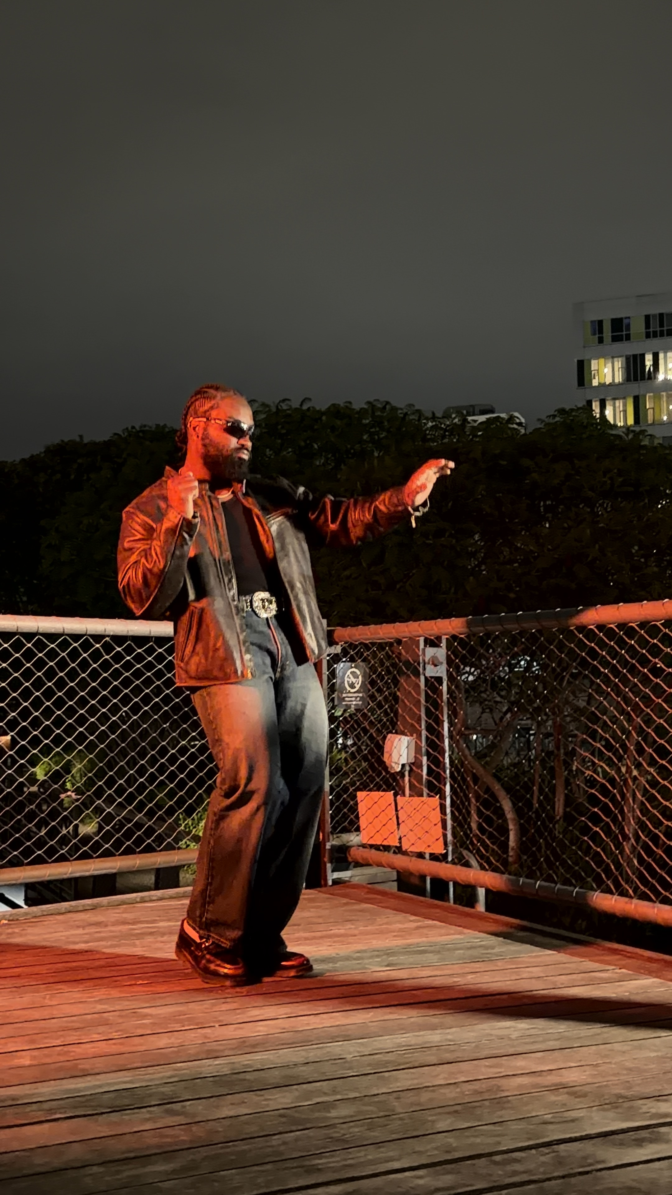 Leather jacket - red light, performing, pointing